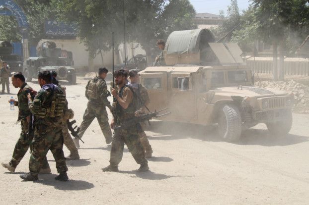 Taliban besiege key Afghan city with US troops set to exit